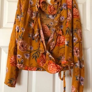 Ruffled flower wrap around top